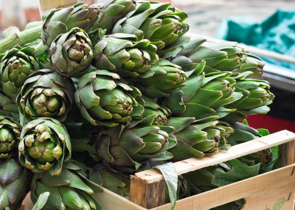 Fruit and vegetables stall in a Venetian boat, Italy